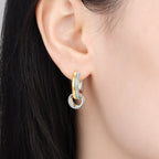Golden Interlocking Two-Tone Hoop Earrings