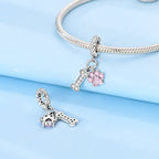 Pink Paw & Bone Dangle Charm