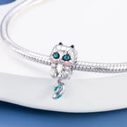Playful Raccoon Charm